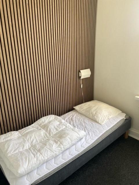Danhostel Odense City Екстер'єр фото A bed with a duvet